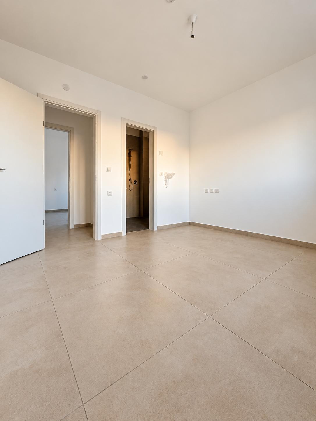 1002777829 Frankel apartment bedroom with built-in wardrobes.