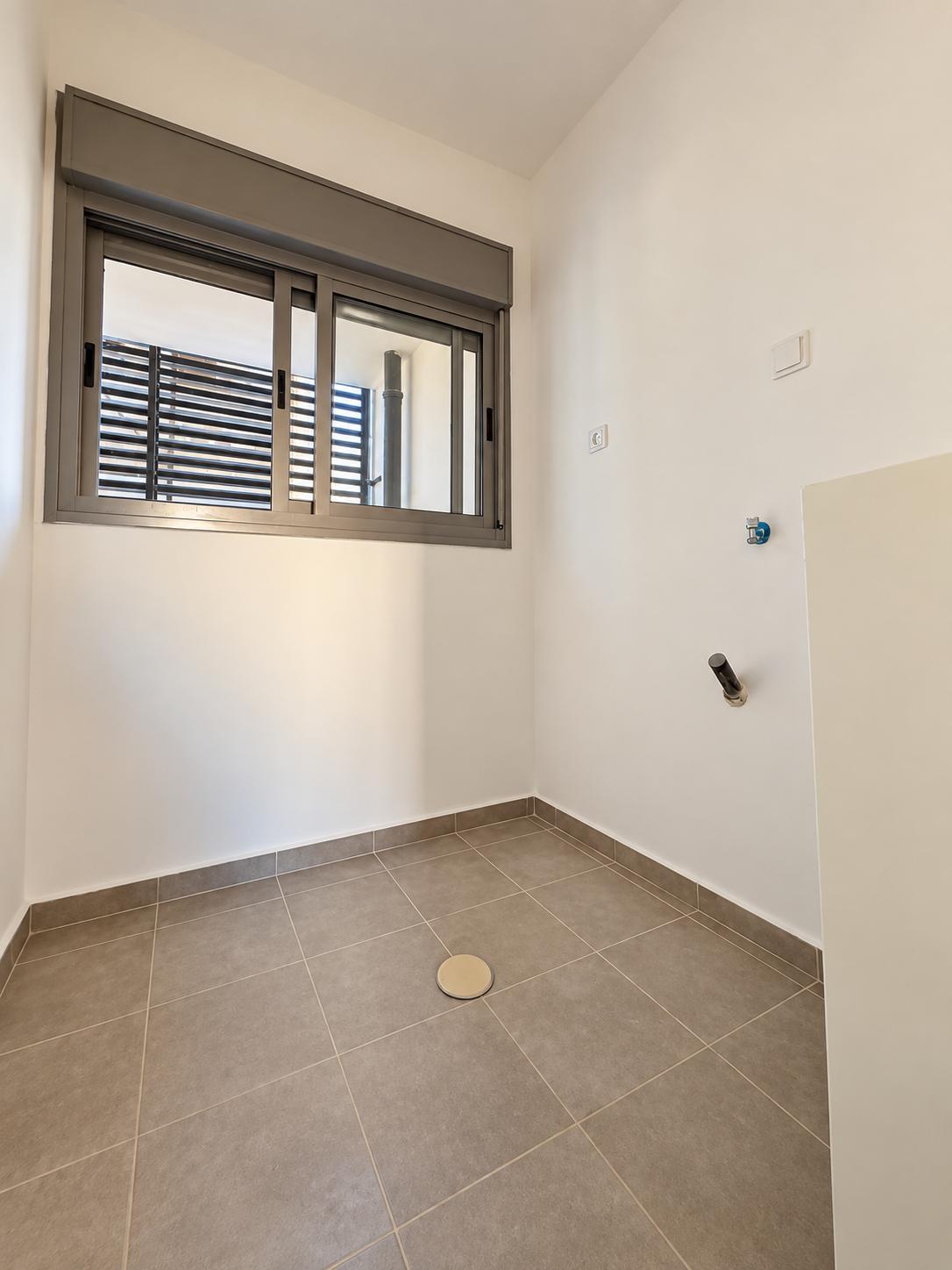 1002777830 Frankel apartment room with shuttered windows.